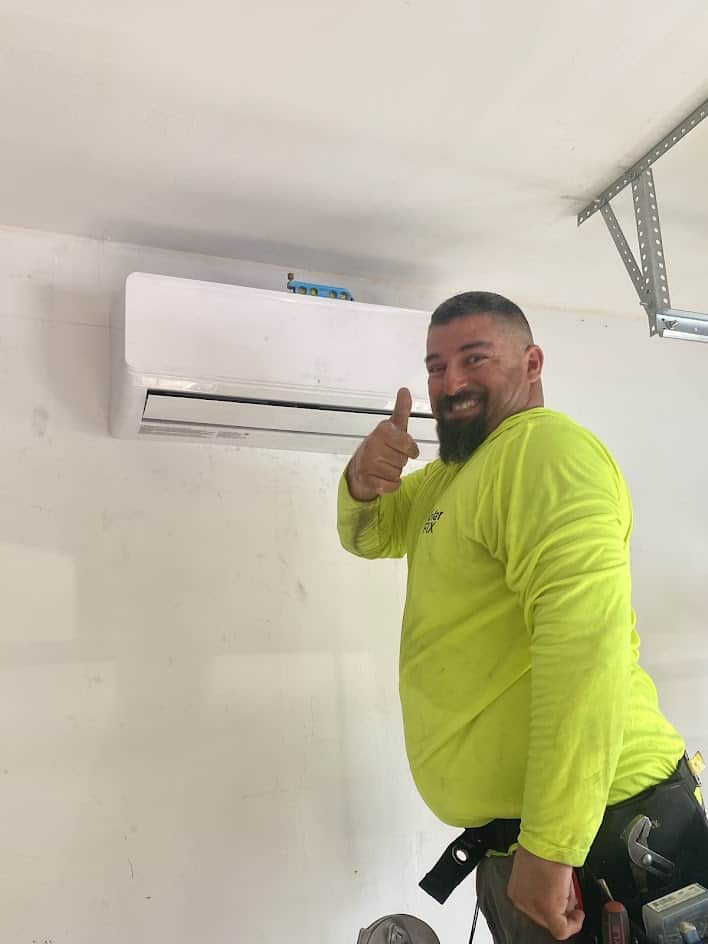 SolarFIX technician with a finished mini split install